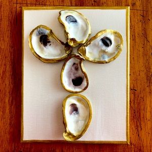 Oyster shell cross on canvas